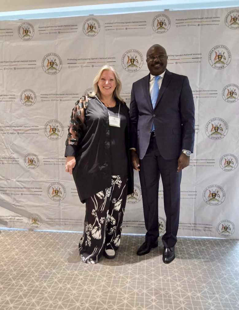 Lorraine Simpson with a representative of the Uganda High Commission in Ottawa